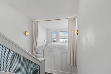 Beautifully updated coastal retreat just steps from the beach