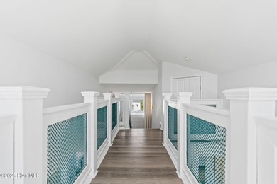 Beautifully updated coastal retreat just steps from the beach