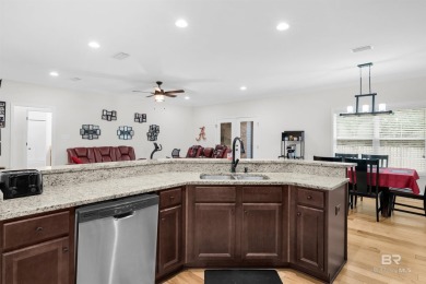 Welcome to this thoughtfully designed 4-bedroom, 3-bathroom home