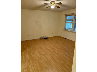 Charming 3-Bedroom Ranch on Nearly Half an Acre Adjacent to