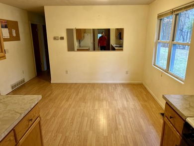 Charming 3-Bedroom Ranch on Nearly Half an Acre Adjacent to