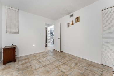 Welcome to Las Salinas Unit E104 - a beautifully updated