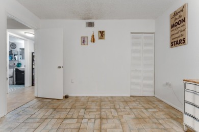 Welcome to Las Salinas Unit E104 - a beautifully updated