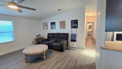 TAKE A LOOK! Step into modern comfort and convenience in this