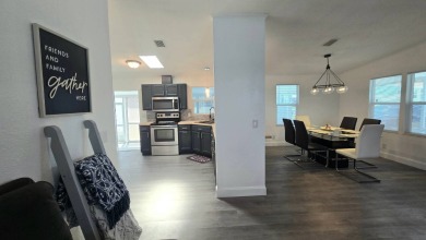 TAKE A LOOK! Step into modern comfort and convenience in this