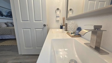 TAKE A LOOK! Step into modern comfort and convenience in this