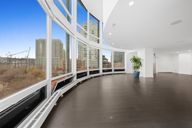 This three-story penthouse at 600 N Kingsbury is a rare