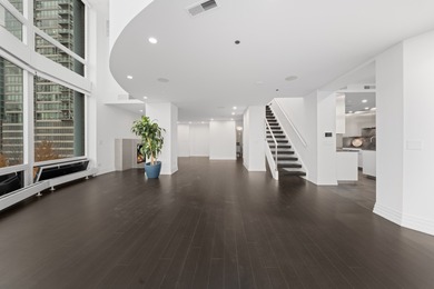 This three-story penthouse at 600 N Kingsbury is a rare