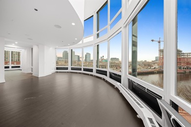 This three-story penthouse at 600 N Kingsbury is a rare
