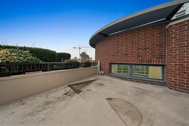 This three-story penthouse at 600 N Kingsbury is a rare