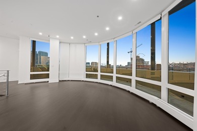 This three-story penthouse at 600 N Kingsbury is a rare