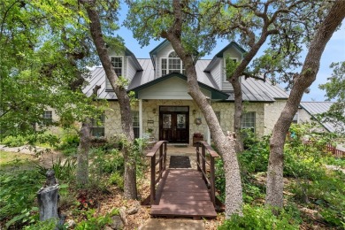 Perched atop a scenic hill overlooking Medina Lake, this