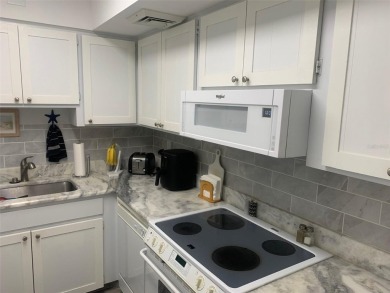 Welcome to this partially furnished 2nd floor condo located in a