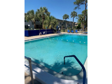 Welcome to this partially furnished 2nd floor condo located in a