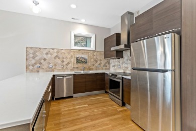 This modern 3-bedroom, 2-bath condo in a newer boutique building