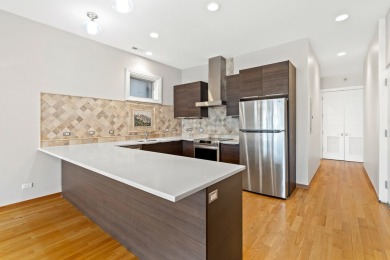 This modern 3-bedroom, 2-bath condo in a newer boutique building