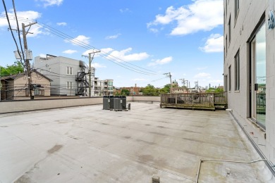 This modern 3-bedroom, 2-bath condo in a newer boutique building