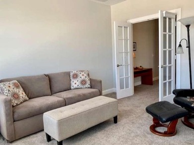 This welcoming 3rd floor corner unit is located in the heart of