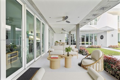 Nestled on nearly an acre in Northeast Pinecrest, this