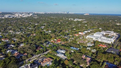 Nestled on nearly an acre in Northeast Pinecrest, this