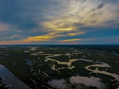 Welcome to 14 Cotillion Court, a beautifully designed raised