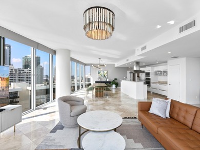 Set on a rare high floor, Unit 2312 captures 180 degrees of