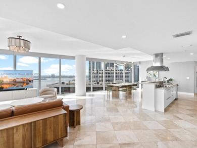 Set on a rare high floor, Unit 2312 captures 180 degrees of