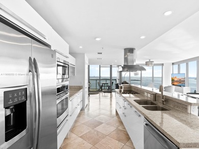 Set on a rare high floor, Unit 2312 captures 180 degrees of