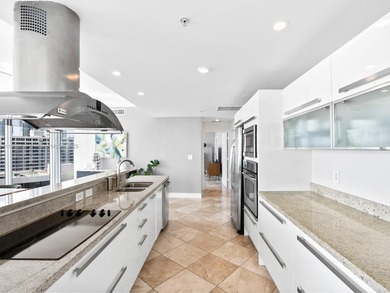 Set on a rare high floor, Unit 2312 captures 180 degrees of