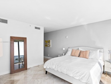 Set on a rare high floor, Unit 2312 captures 180 degrees of