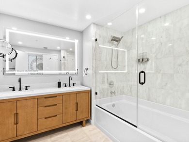 Set on a rare high floor, Unit 2312 captures 180 degrees of