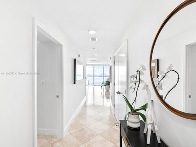 Set on a rare high floor, Unit 2312 captures 180 degrees of