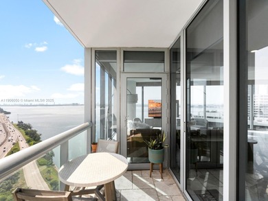 Set on a rare high floor, Unit 2312 captures 180 degrees of