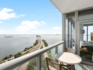 Set on a rare high floor, Unit 2312 captures 180 degrees of