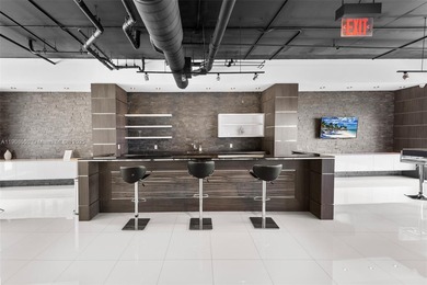 Set on a rare high floor, Unit 2312 captures 180 degrees of