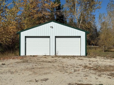 TWO HOMES ON 1.24 ACRES! Welcome to 160 Kootenai Creek Road