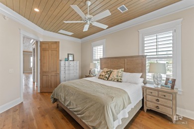 Just steps from the sugar-white sands of the Gulf, this