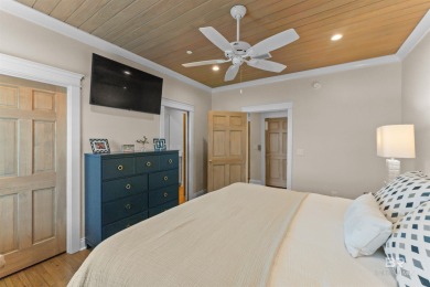 Just steps from the sugar-white sands of the Gulf, this