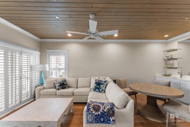 Just steps from the sugar-white sands of the Gulf, this