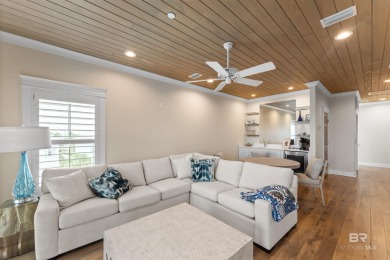 Just steps from the sugar-white sands of the Gulf, this