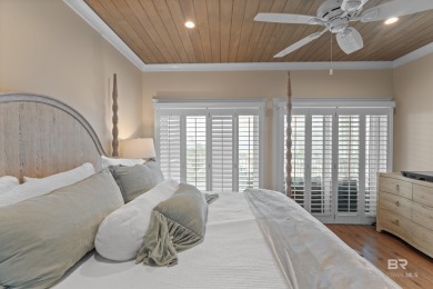 Just steps from the sugar-white sands of the Gulf, this