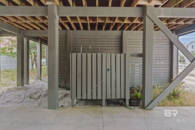 Just steps from the sugar-white sands of the Gulf, this