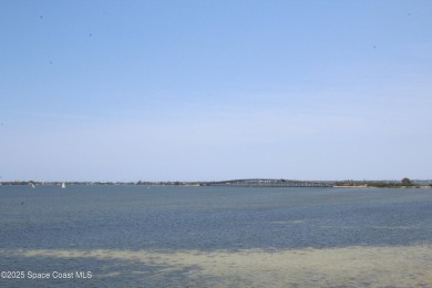 Absolutely pristine corner END UNIT direct Riverfront condo