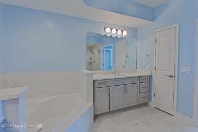 Absolutely pristine corner END UNIT direct Riverfront condo