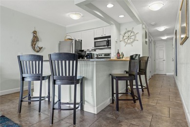 Own a fully furnished 1-bedroom, 1-bath waterfront condo in