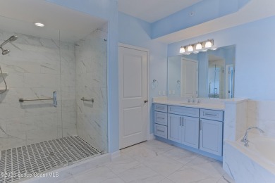 Absolutely pristine corner END UNIT direct Riverfront condo