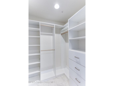 Absolutely pristine corner END UNIT direct Riverfront condo