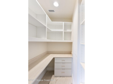 Absolutely pristine corner END UNIT direct Riverfront condo