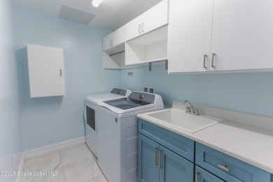 Absolutely pristine corner END UNIT direct Riverfront condo