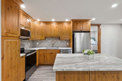 Elegantly remodeled in the last two years, this 3-level, 2,096SF